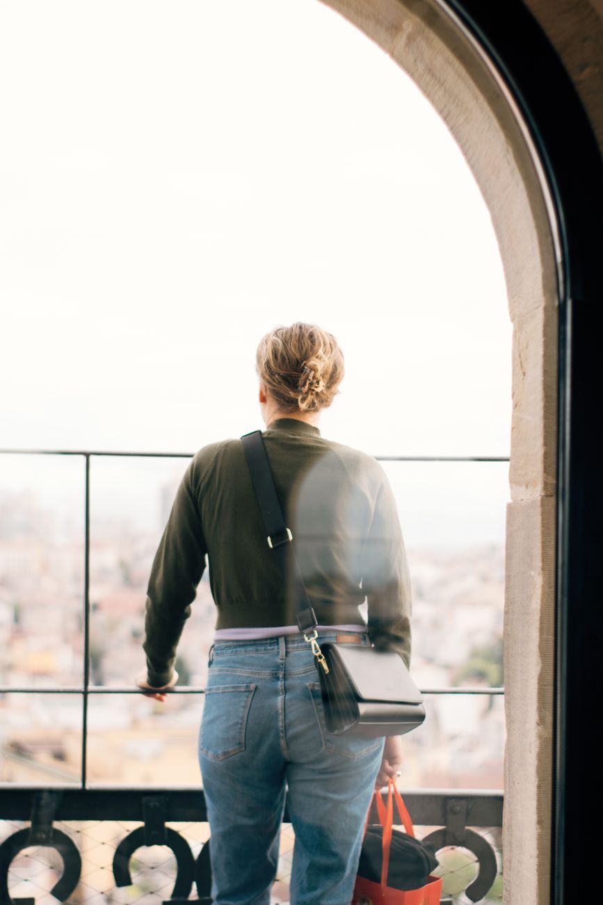 Curator overlooking mountain terrace