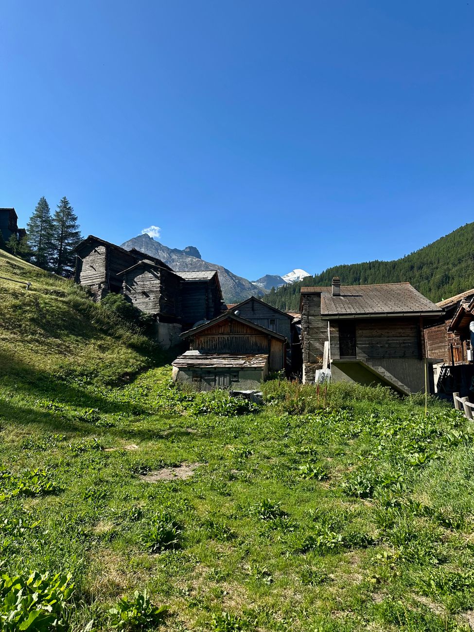 Majestic Swiss alpine peaks overlooking valley chalets